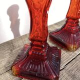 Pair of amber glass candlesticks