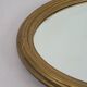 Miroir ovale en bois doré, style Louis XVI