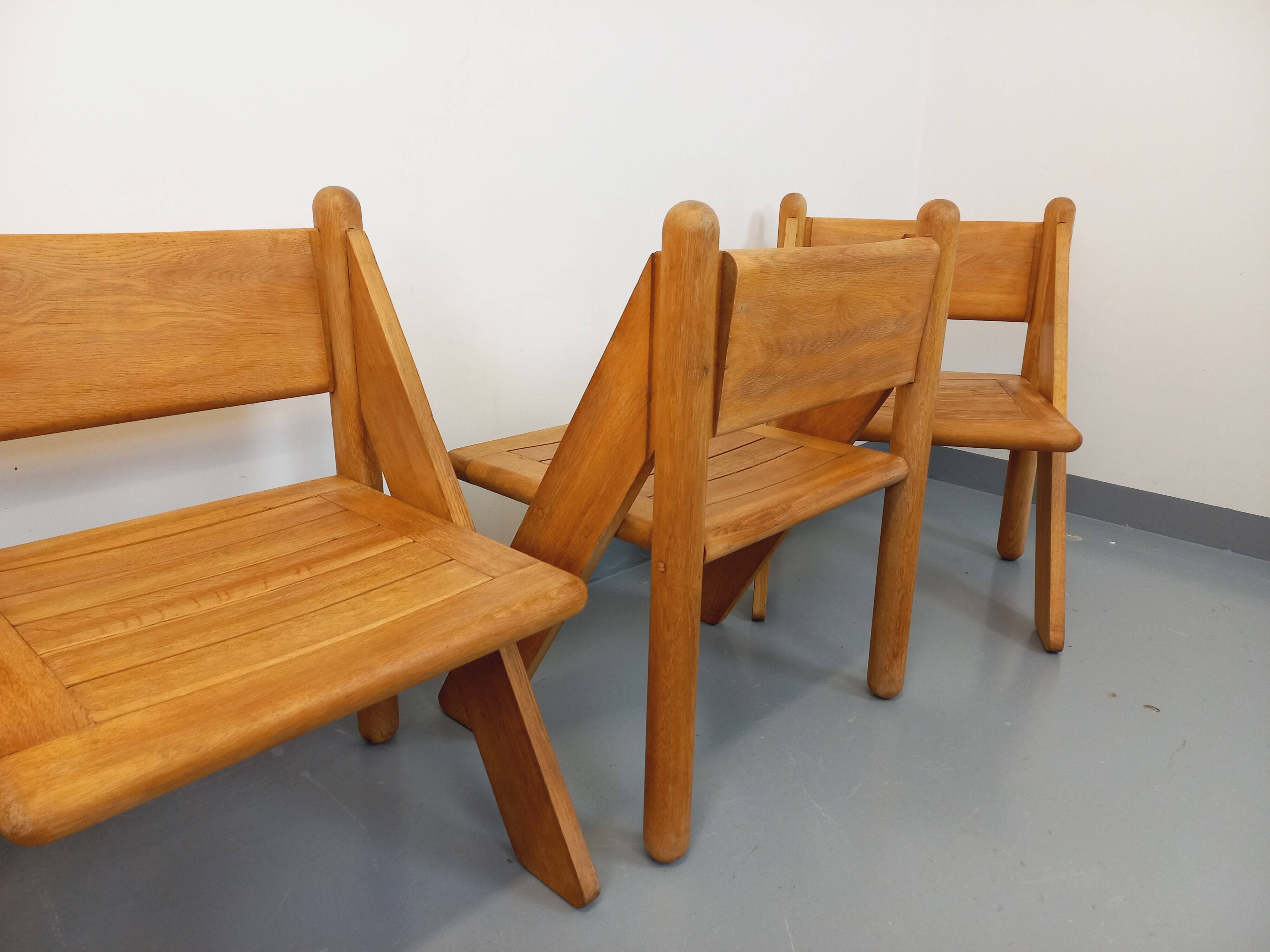 Set of 4 vintage brutalist chairs in solid oak from the 1960s.