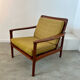 Old Scandinavian design armchair in vintage teak year 60