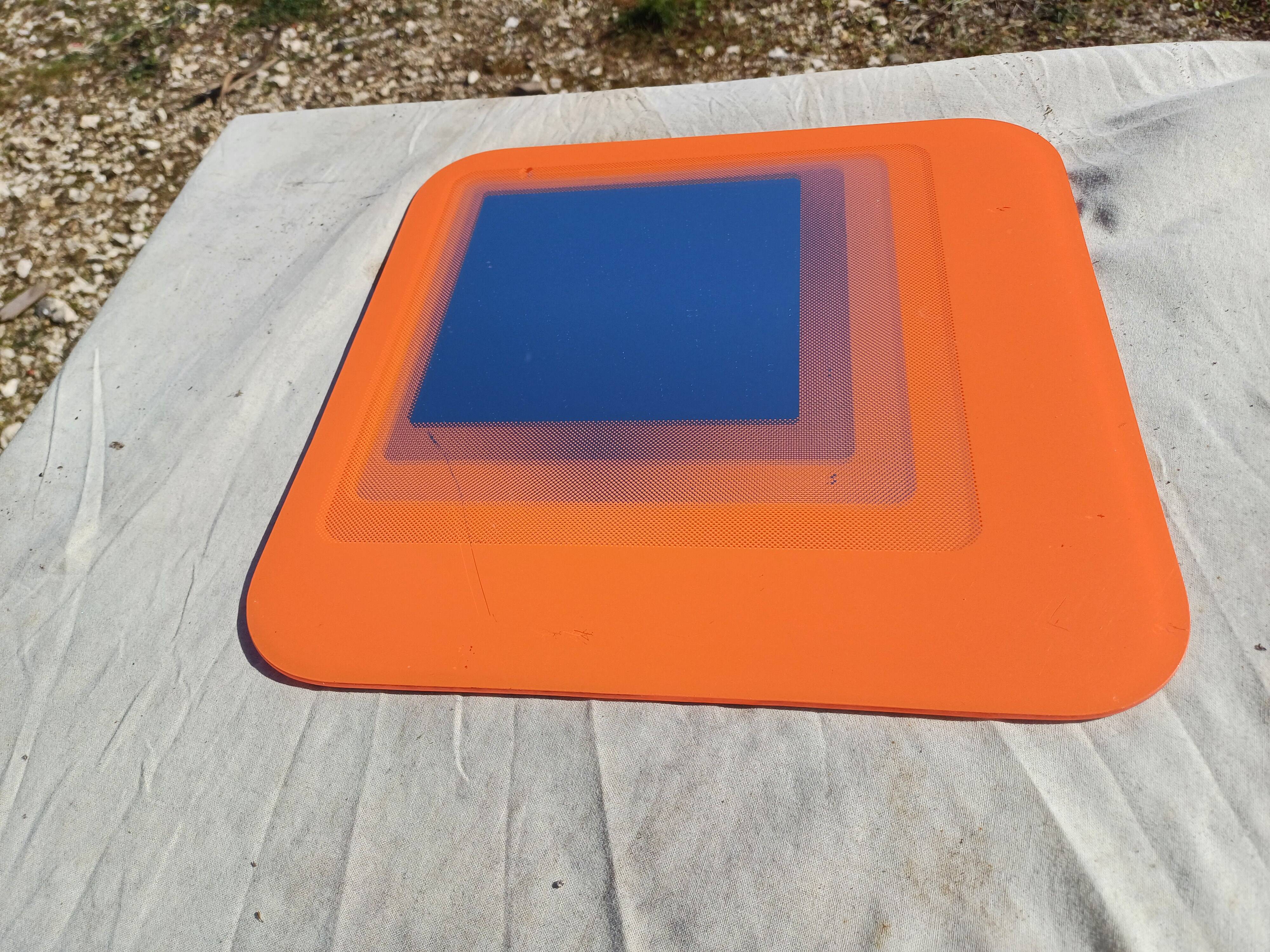 Vintage orange glass mirror