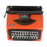 Machine à écrire orange et noire Brother 210