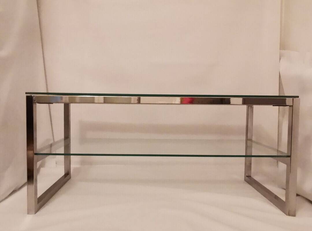 1980s coffee table with a double chrome metal top.