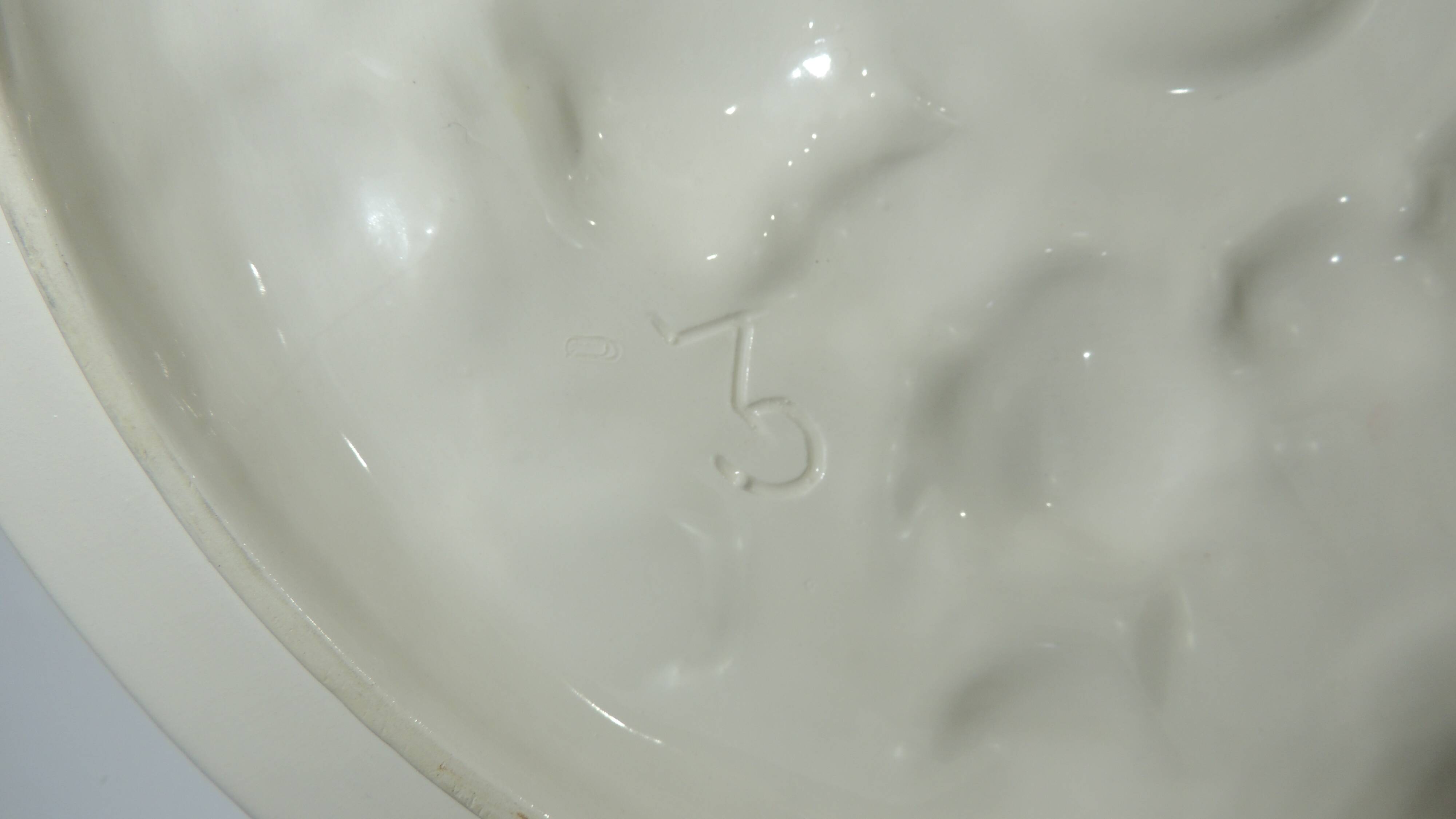 Magnificent fruit tart dish in slip signed "What's Vincent Cadeaux
