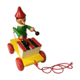 Old toy to pull Pinocchio and his xylophone
