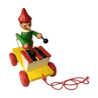 Old toy to pull Pinocchio and his xylophone