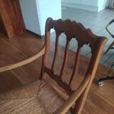 antique cherry and straw armchair with cathedral back