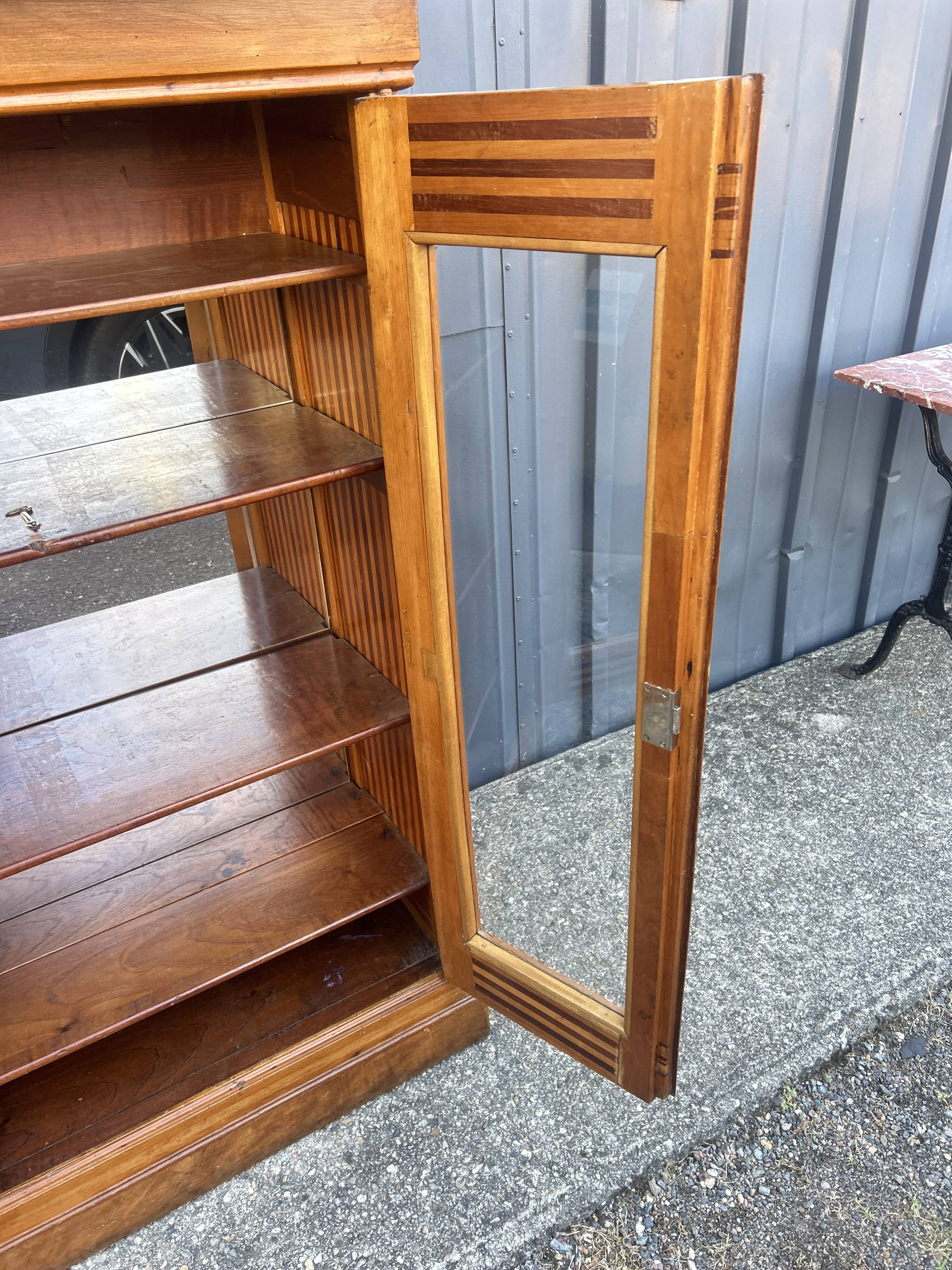 Two-door mahogany display cabinet
