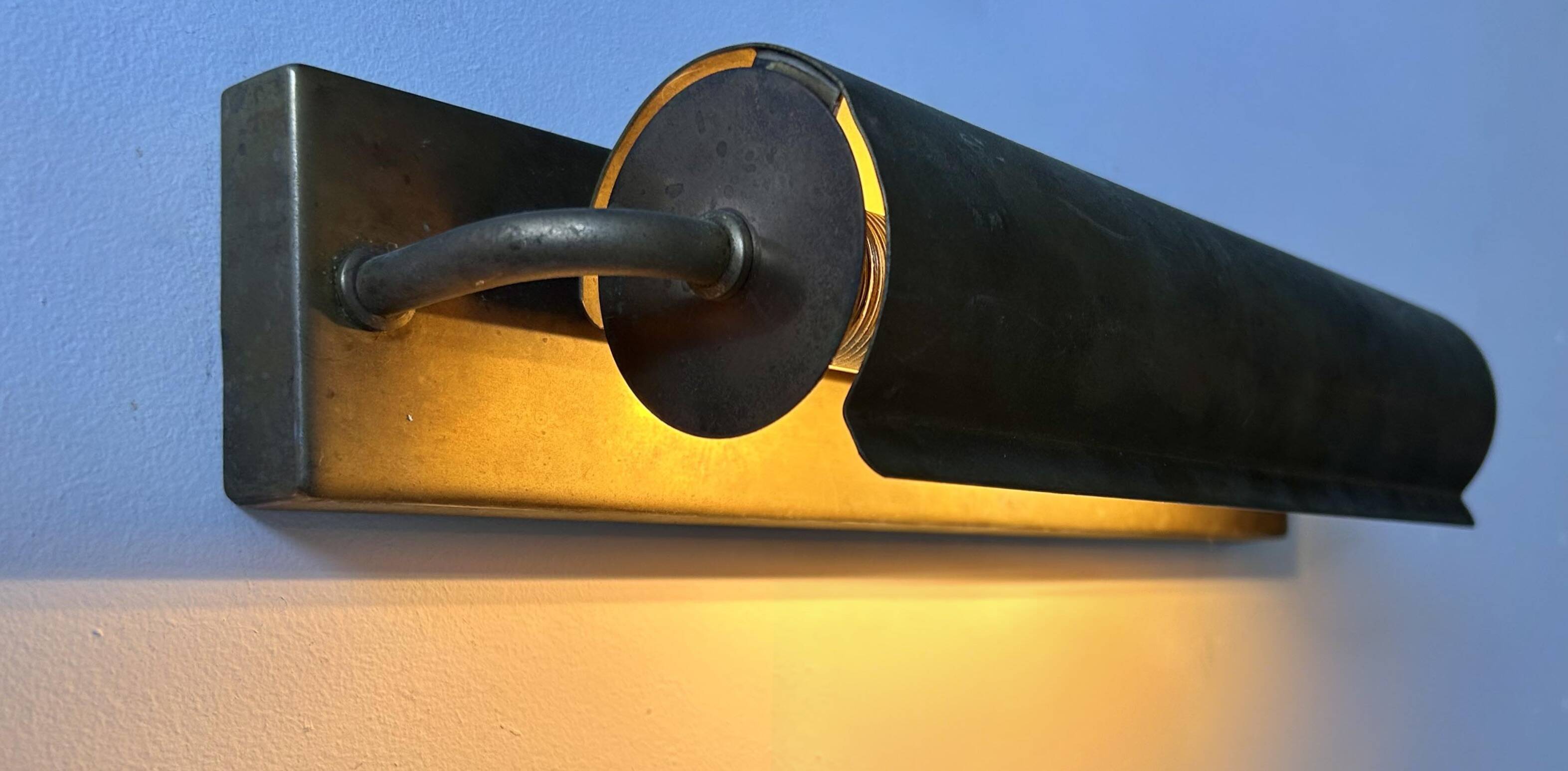 Modernist solid brass wall light, France 1940