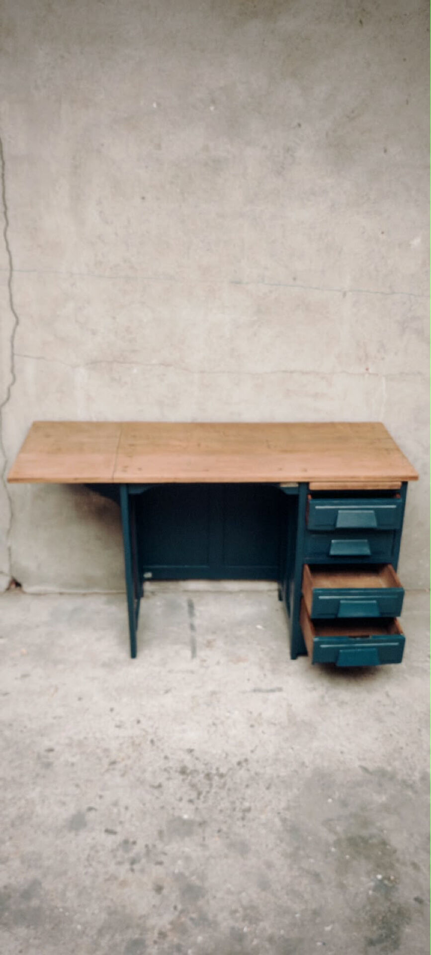 Antique desk with drawers and shelf