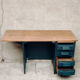Antique desk with drawers and shelf