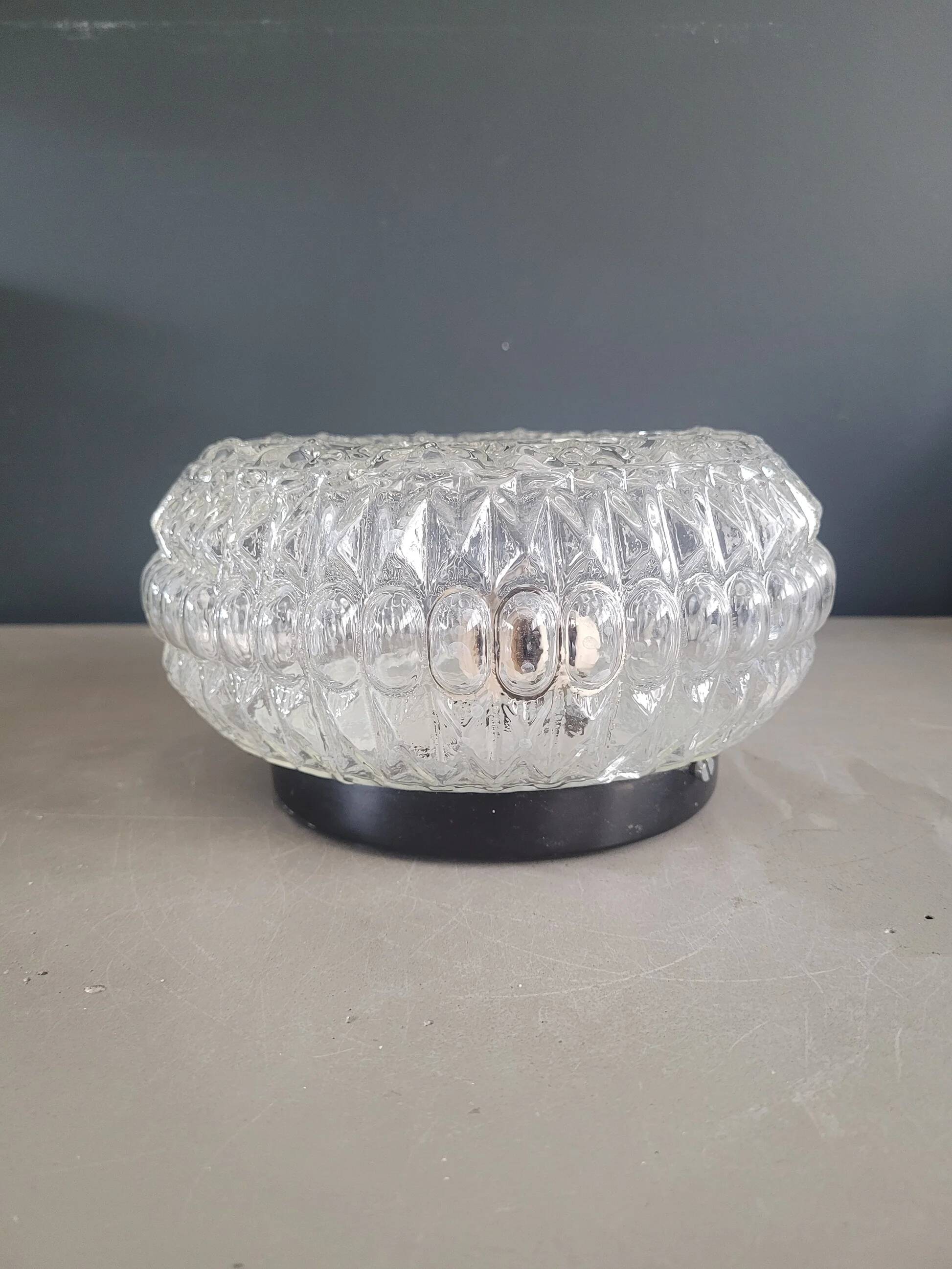 Ceiling light or wall light in moulded glass