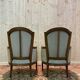 Paire de fauteuils bergères de style Louis XVI