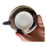 CHINA, 20th century Part of a porcelain tea service with polychrome decoration of palace scenes and v