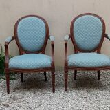 Paire de fauteuils médaillon style Louis XVI