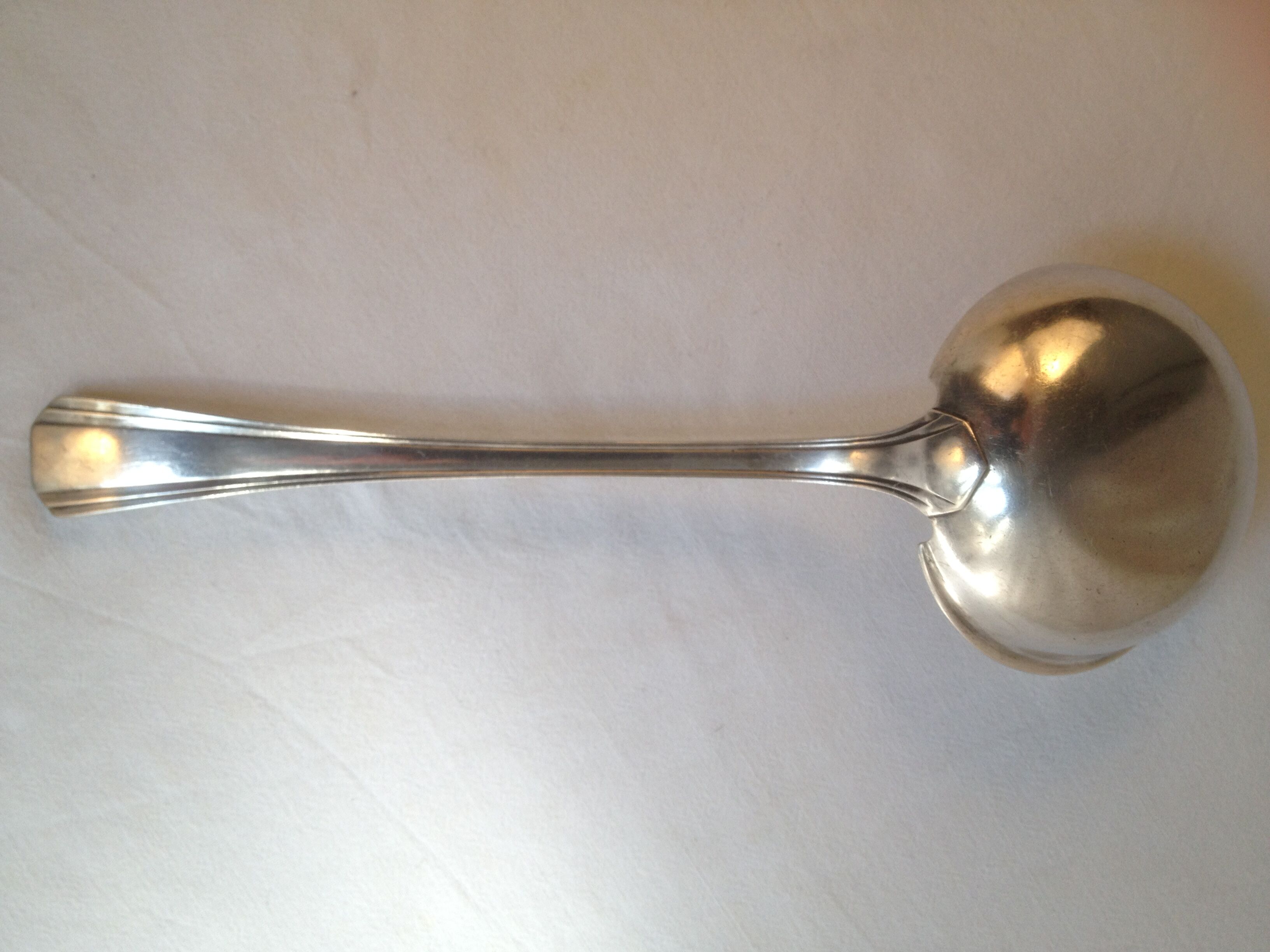 Cream ladle, Christofle, Boreal model in silver metal