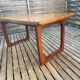 Extendable teak table, sled base, vintage style.