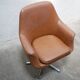 Vintage swivel desk chair in imitation leather
