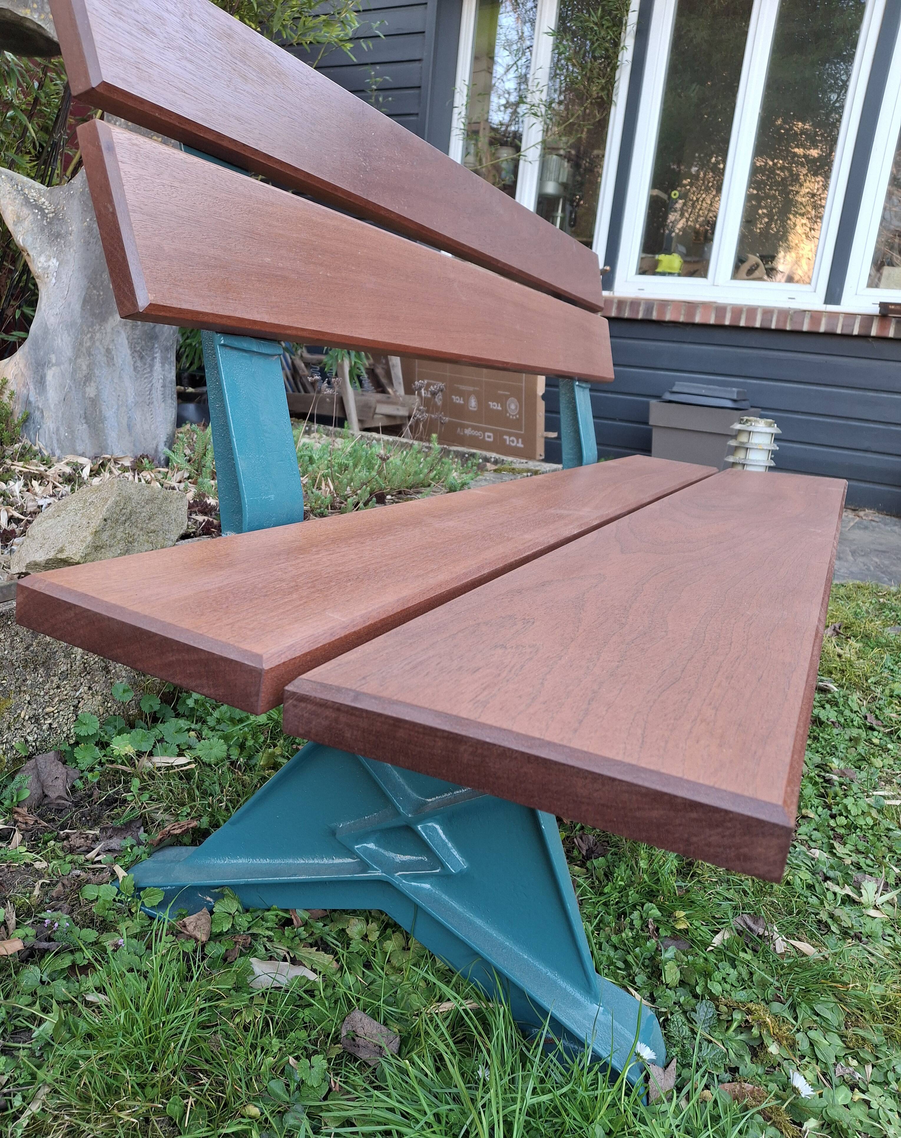Garden bench, cast iron legs and exotic wood
