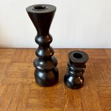 Pair of black turned wood candlesticks