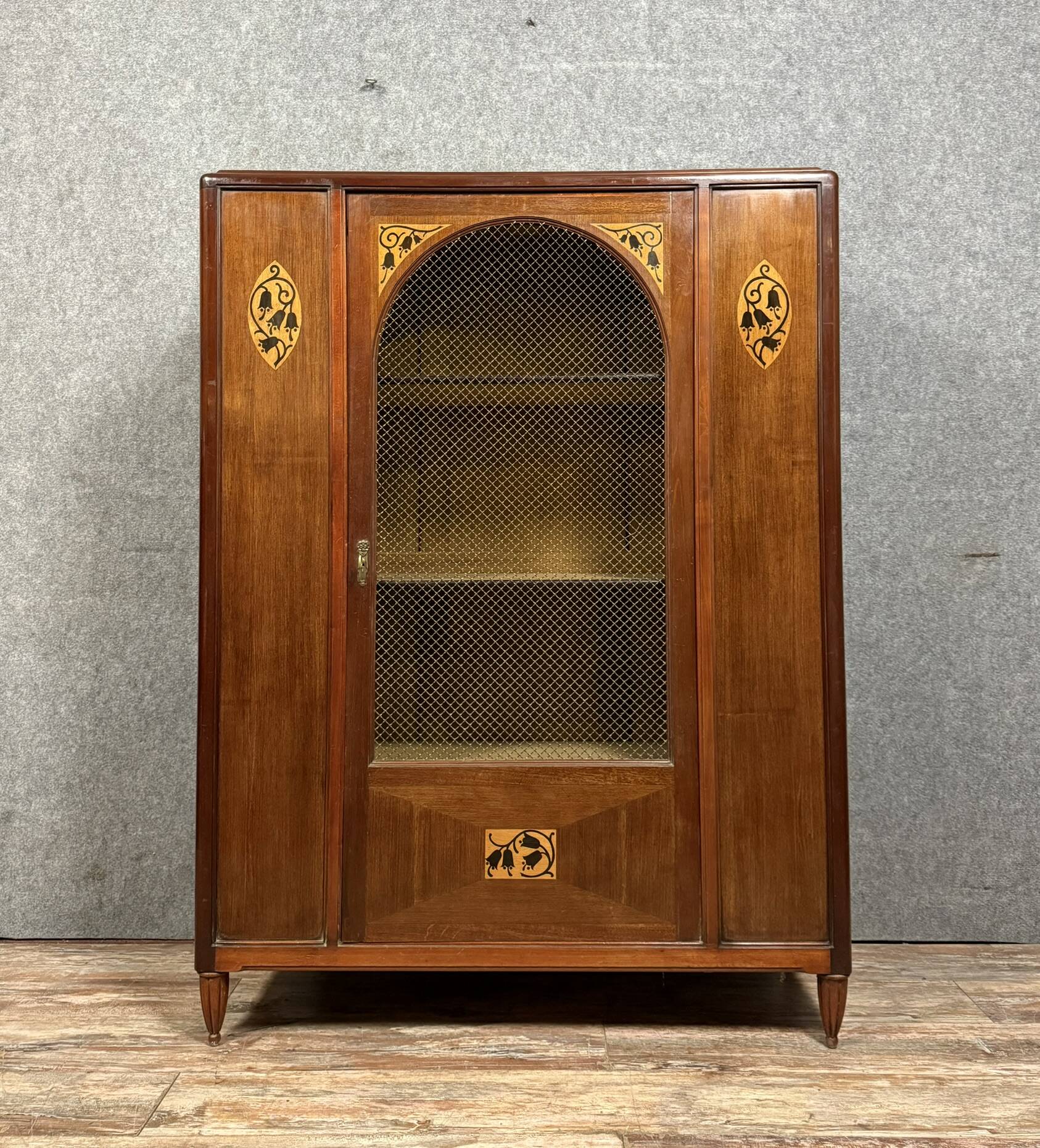 According to Maurice Dufrene: Art Nouveau period marquetry library around 1900