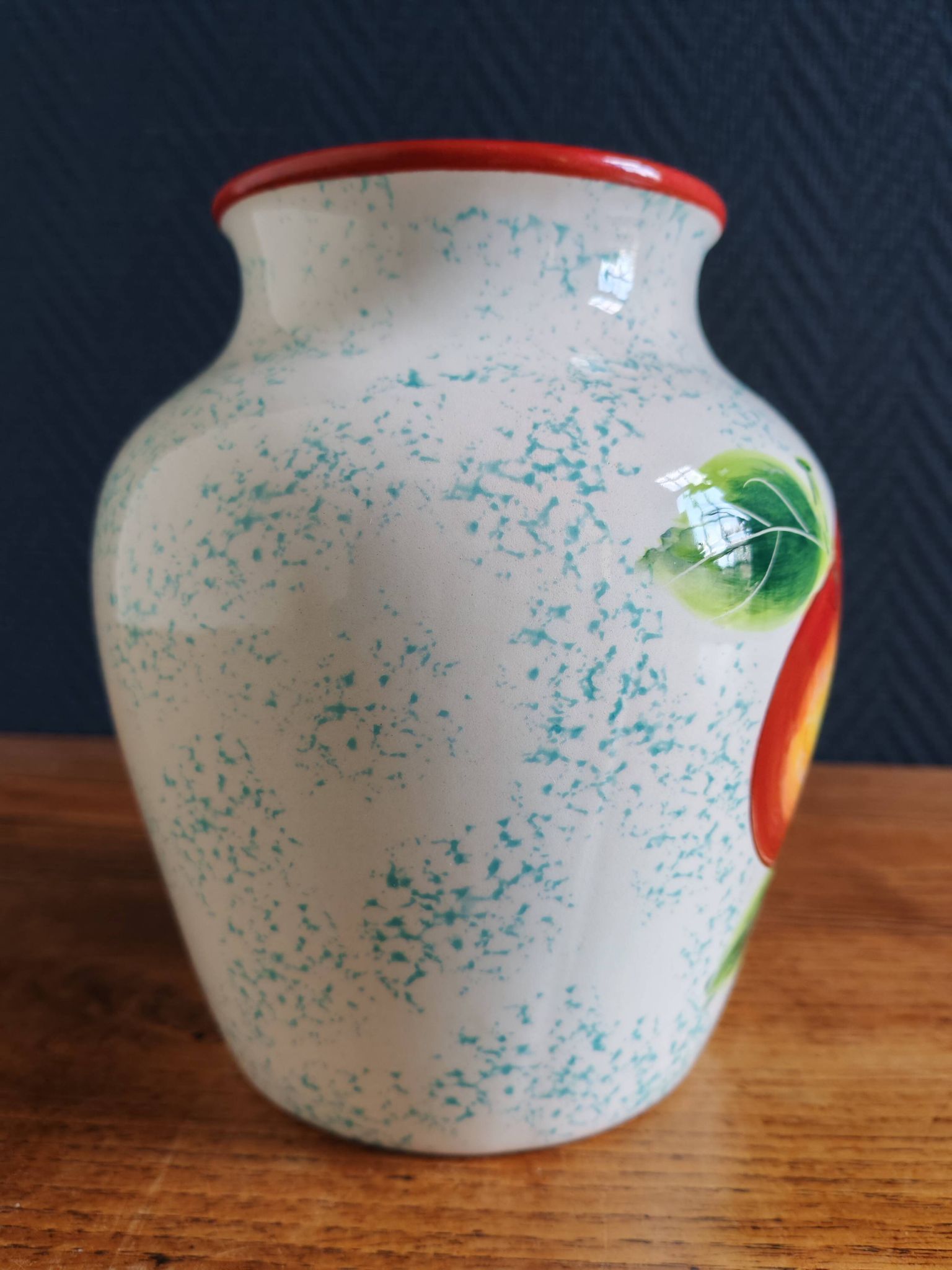 White Ceramic Vase with Peach and Leaf Motifs