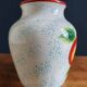 White Ceramic Vase with Peach and Leaf Motifs