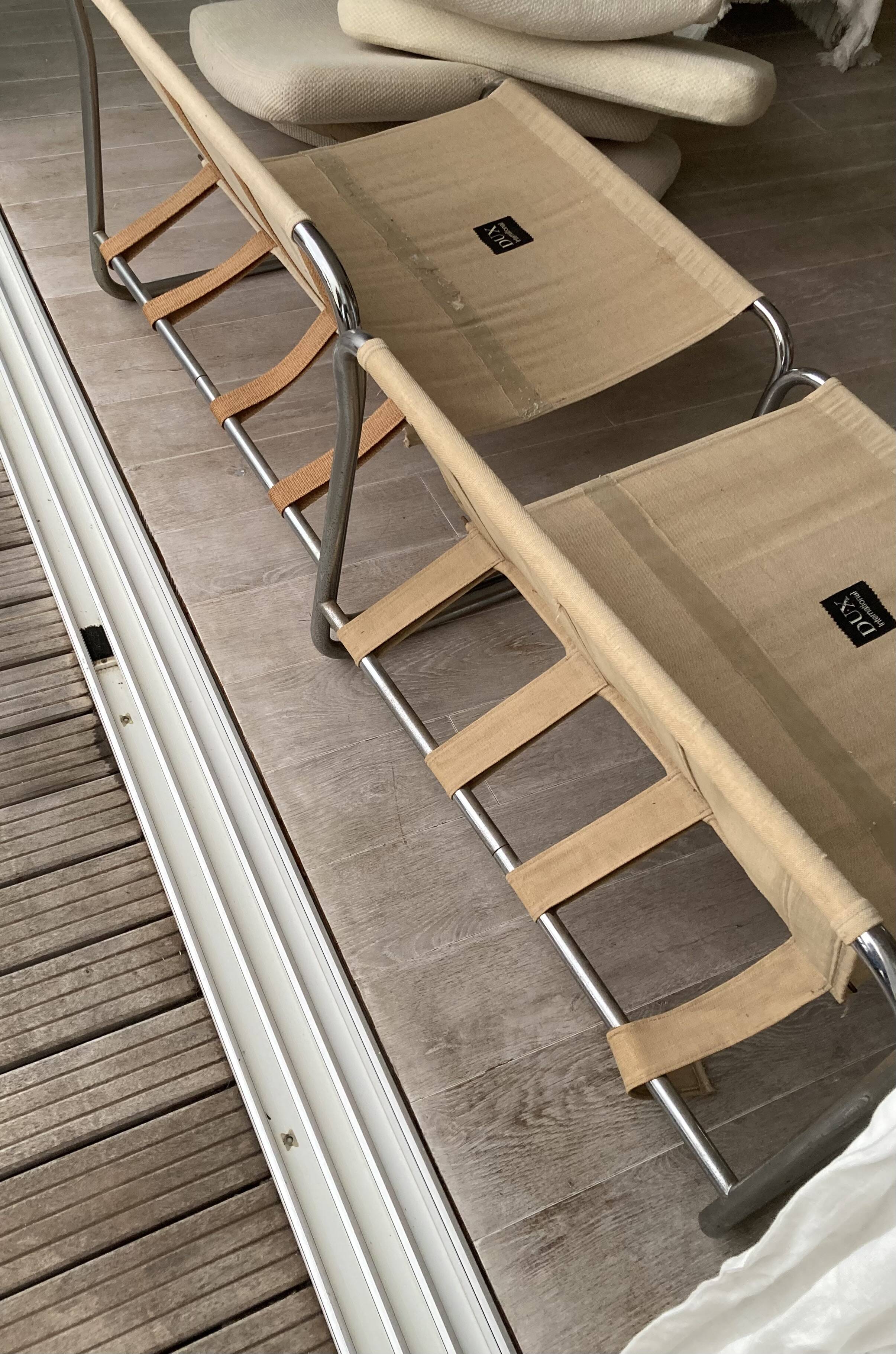 Pair of vintage lounge chairs DUX International from the 60s-70s.