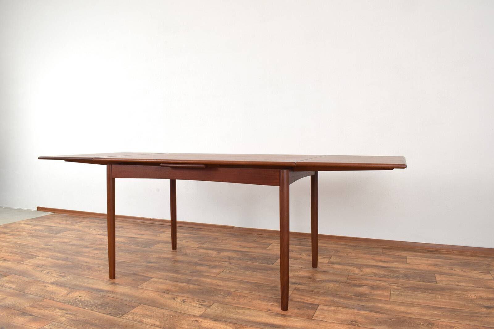 Mid-century Danish teak extendable dining table, 1960s.