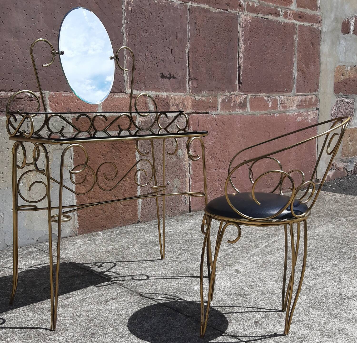 Dressing table and chair in gilded metal and opaline glass.