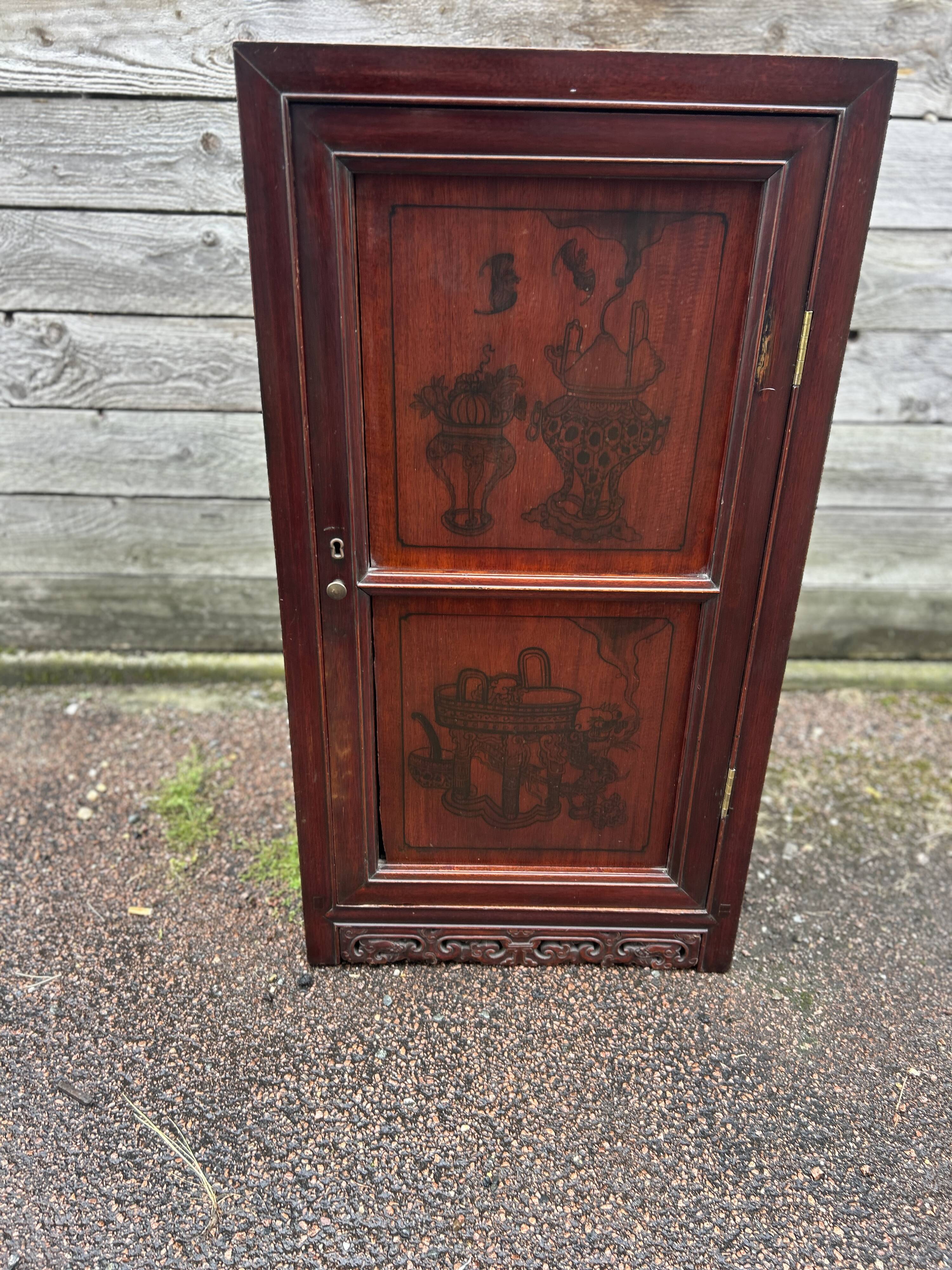 Small cabinet with one door, Indonesian.