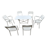 Garden furniture in wrought iron and wooden slats composed of two armchairs, 4 chairs and a table.