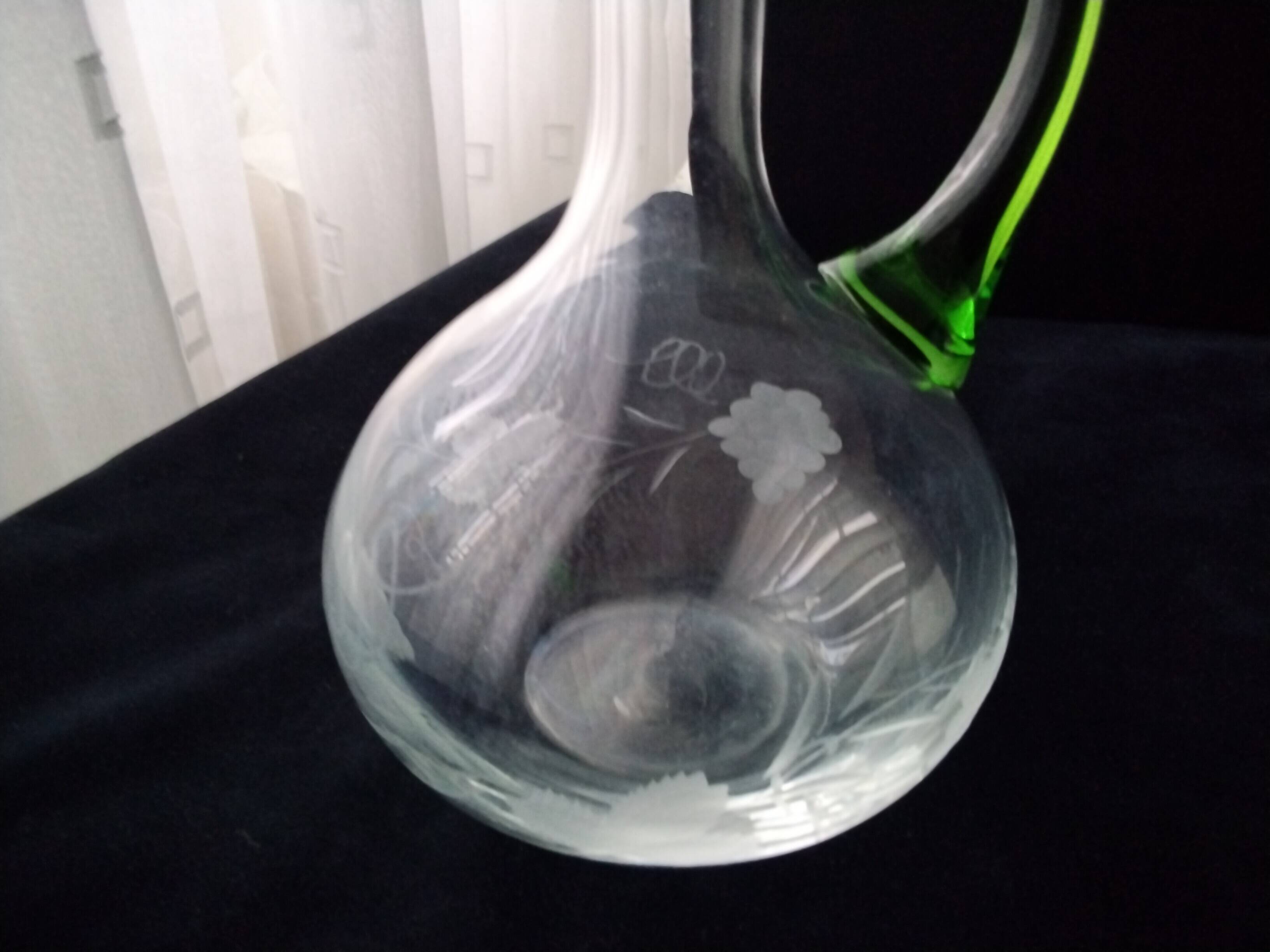 Blown glass wine carafe with engraved decoration