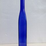Blue glass bottle, square