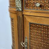 Half-moon commode in the Louis XVI style