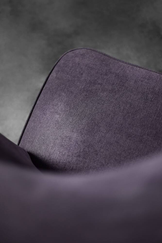 High-backed wing chair in oak and purple fabric, vintage Scandinavian style from the 1950s.