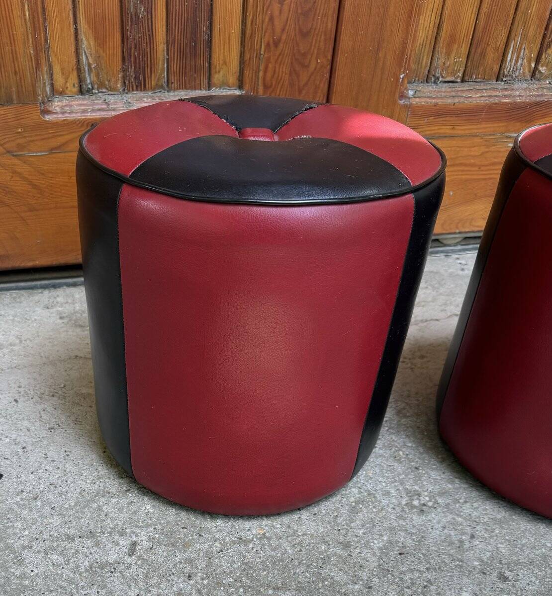 Set of 2 Mid-Century bordeaux and black ottomans in faux leather (upholstery fabric) - 1950s