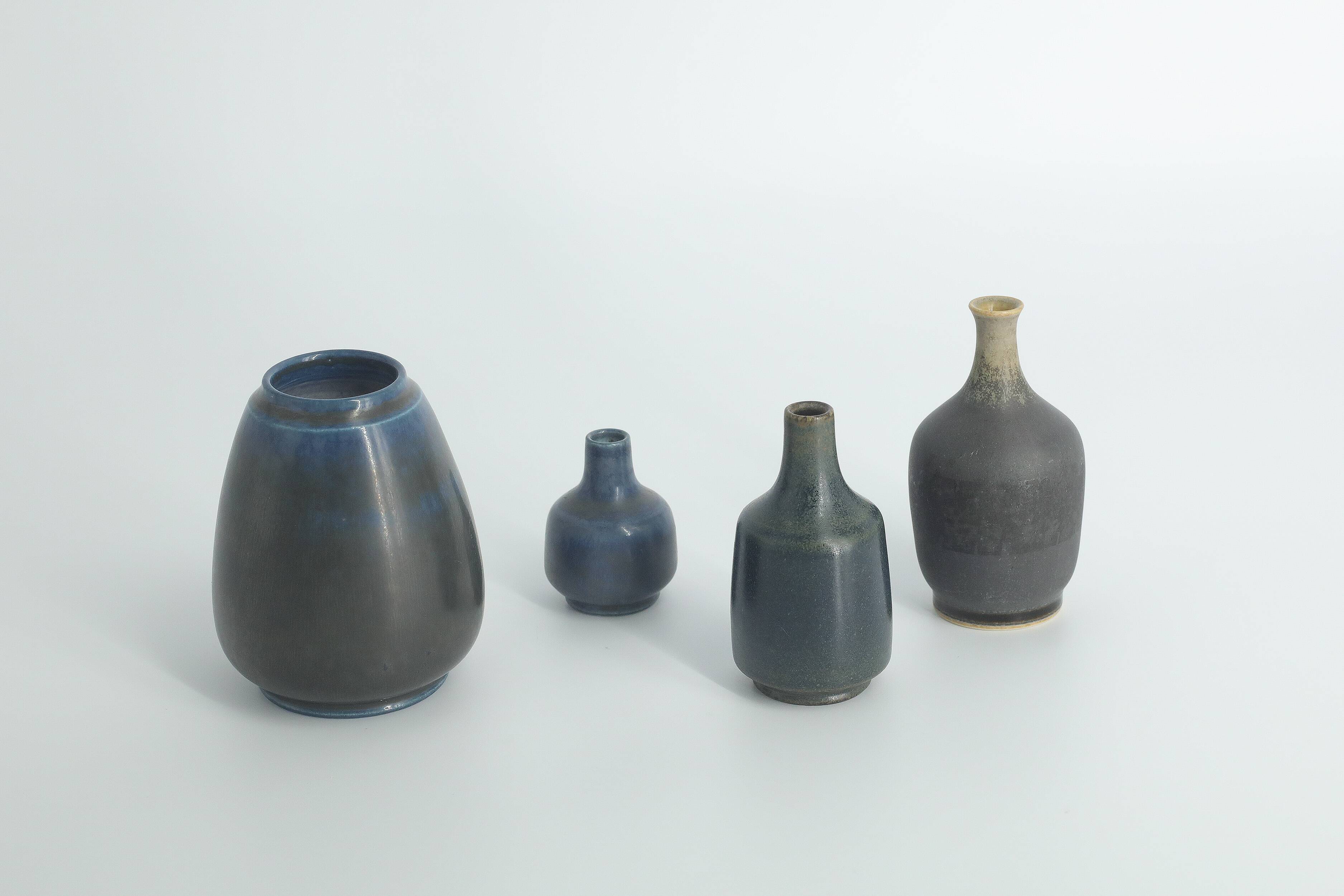 Set of 4 Mid-Century Scandinavian collectible vases in blue and brown stoneware by Gunnar Borg.