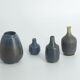 Set of 4 Mid-Century Scandinavian collectible vases in blue and brown stoneware by Gunnar Borg.