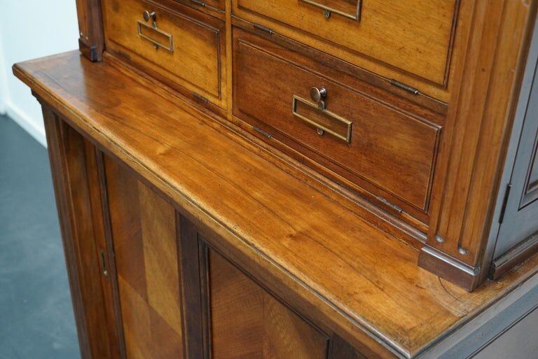 Walnut apothecary furniture France 1920s