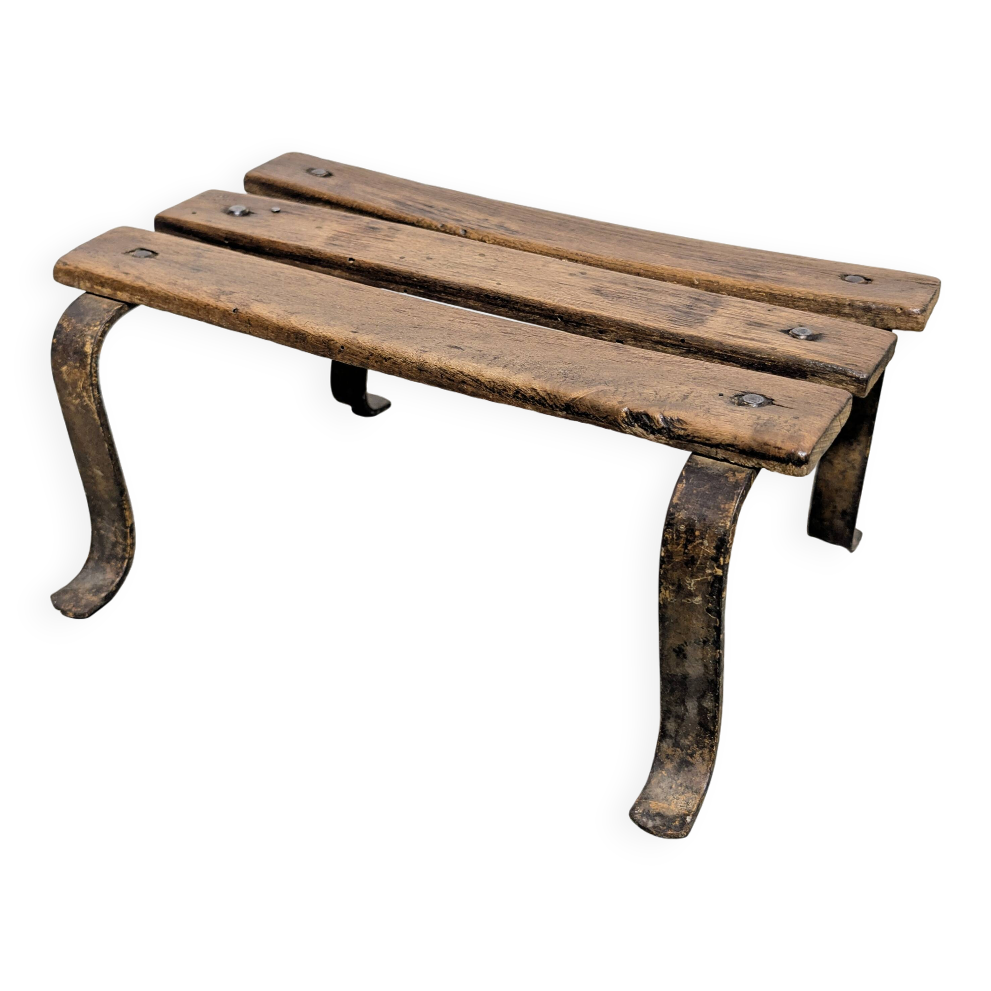 Antique iron and wood footrest