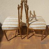 Pair of chairs with a golden lyre
