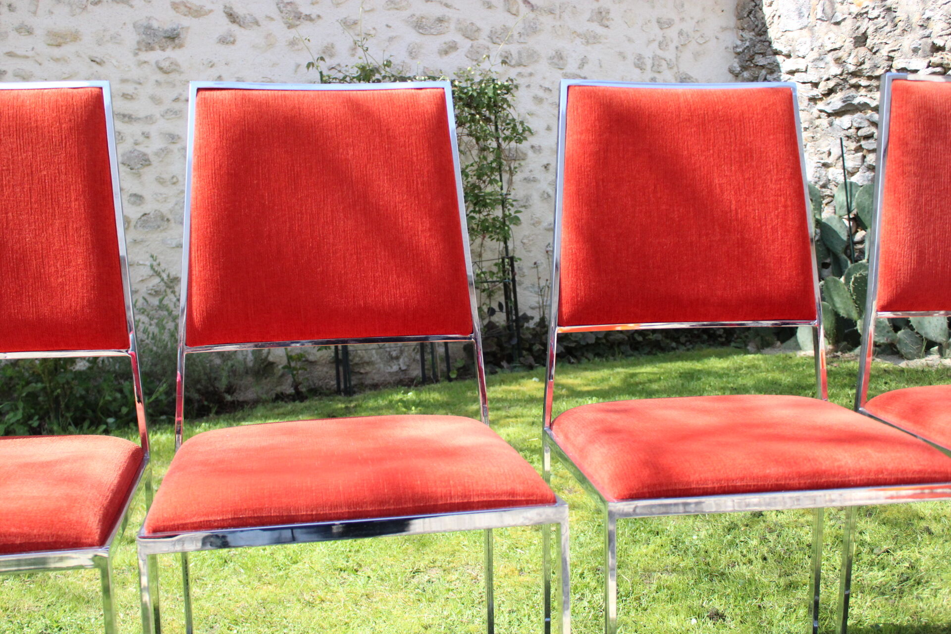 4 Chrome chairs in vintage orange velvet