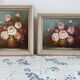 Pair of oils on canvas signed by Robert Cox, floral still lifes.