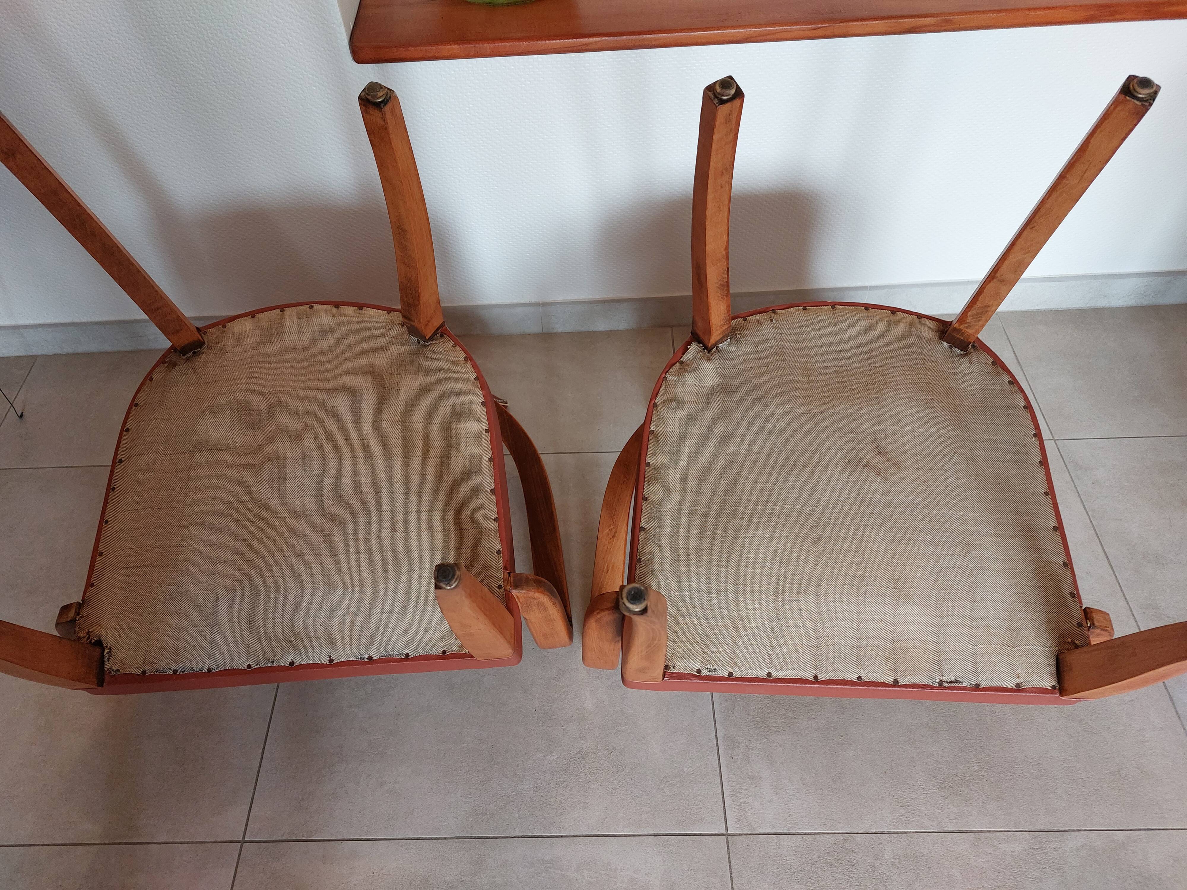 2 terra cota color bridge armchairs