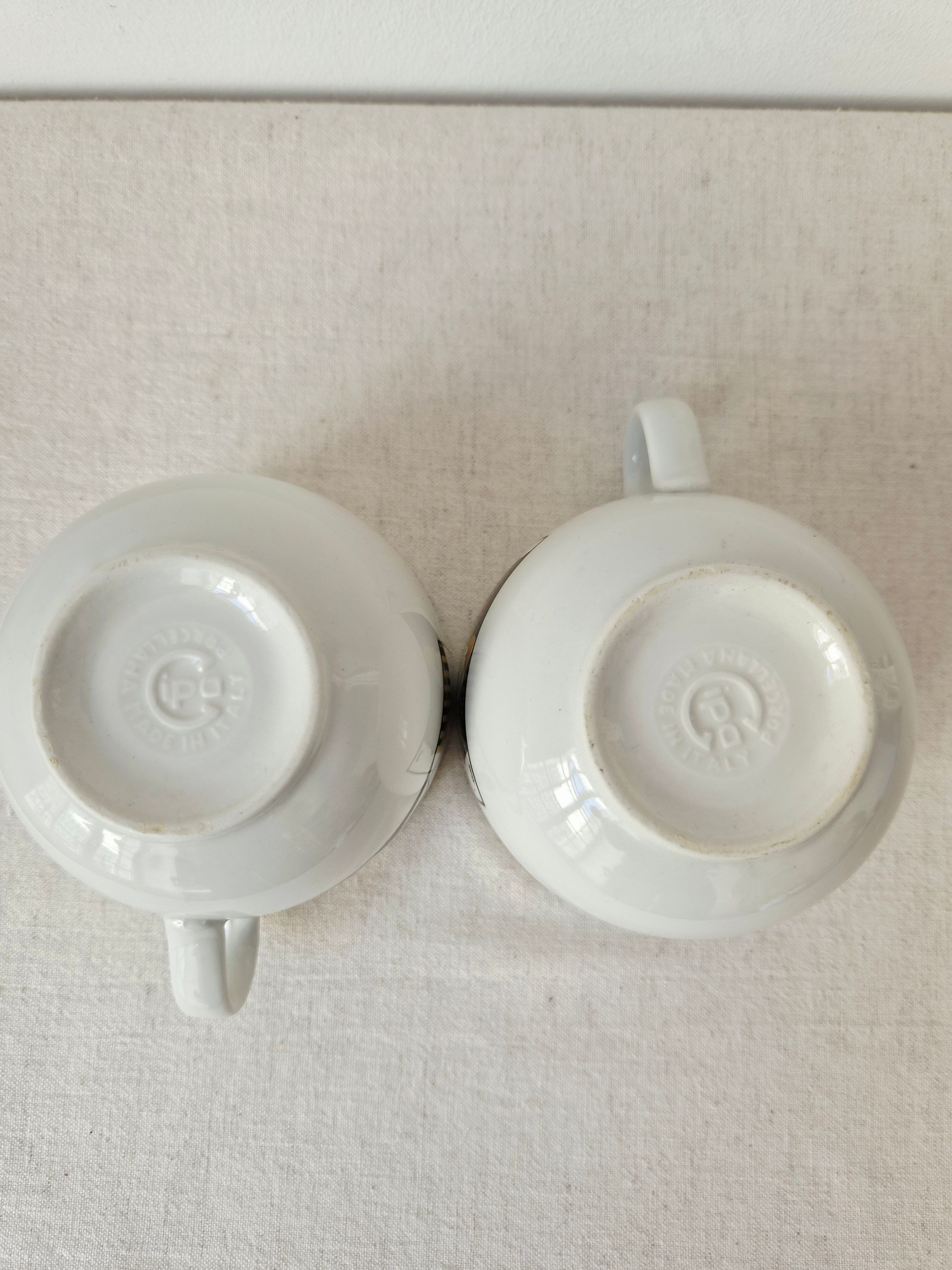 Set of 2 large Art Deco porcelain mugs by Roberto Tortoli.
