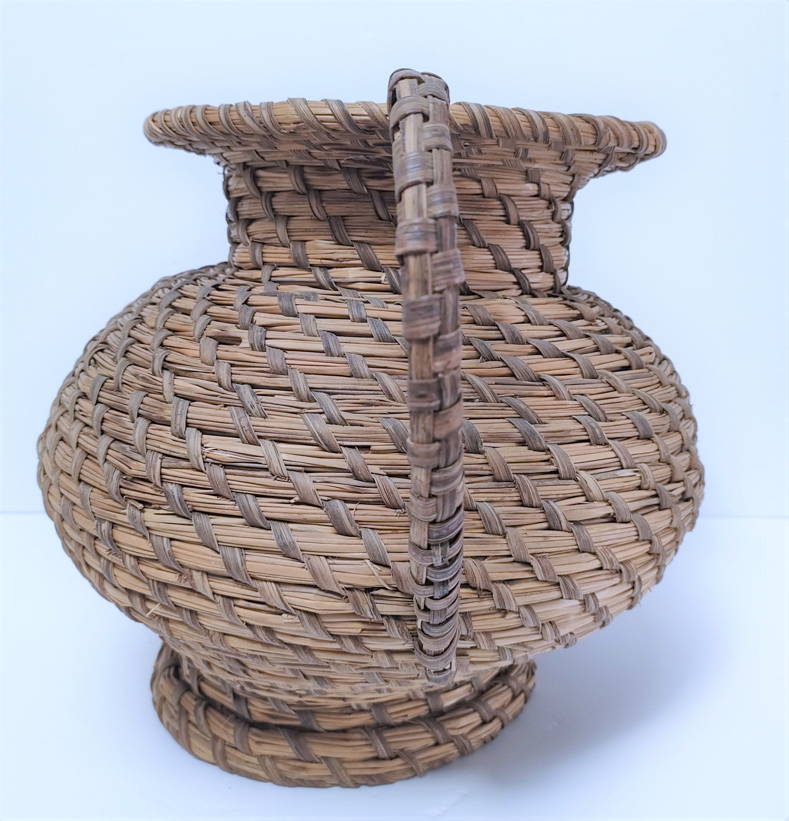 Vase in straw and plant fibers French folk art mid-twentieth century