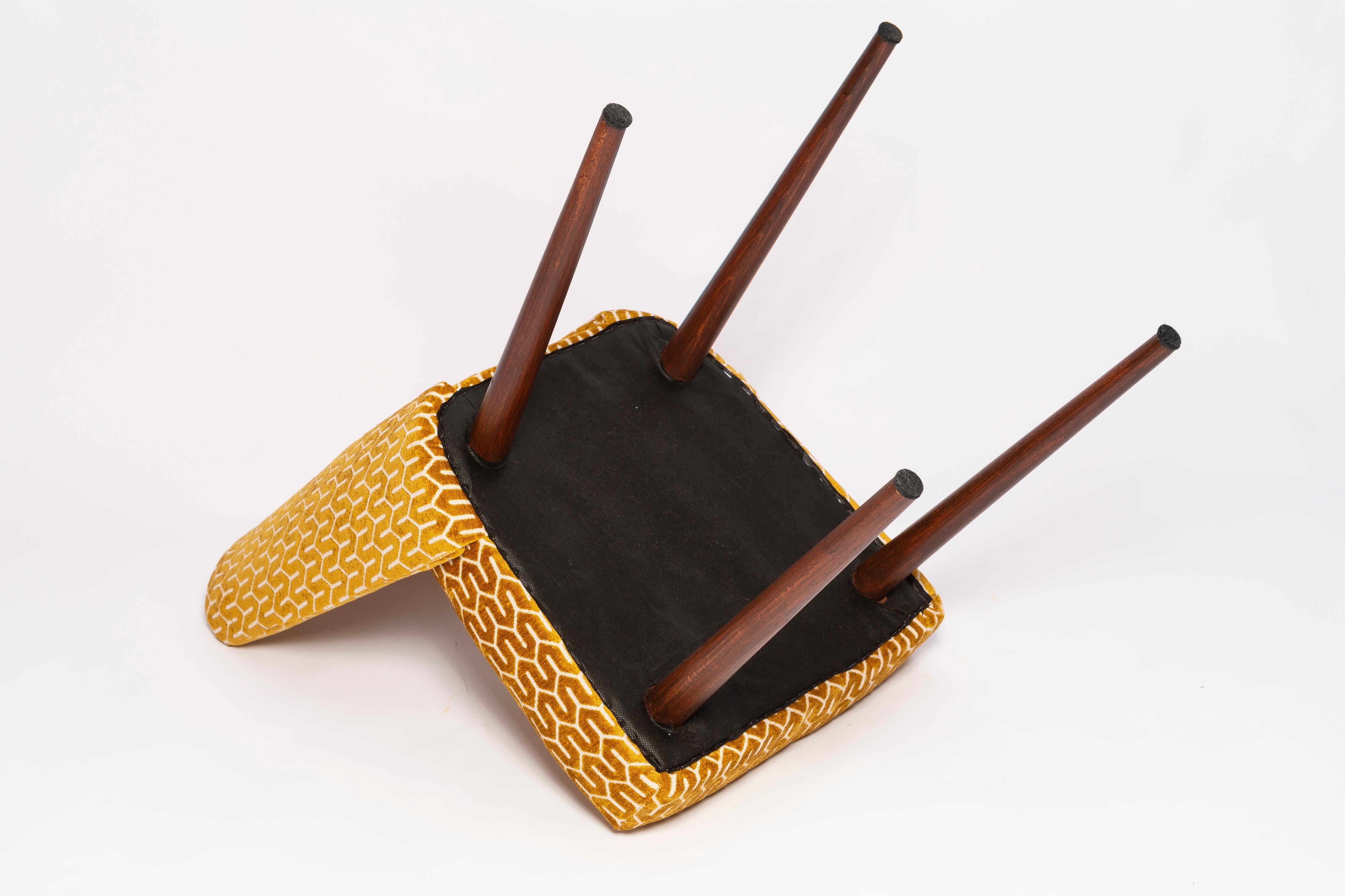 Mustard yellow shell chair, mid-century style, Europe, 1960s.