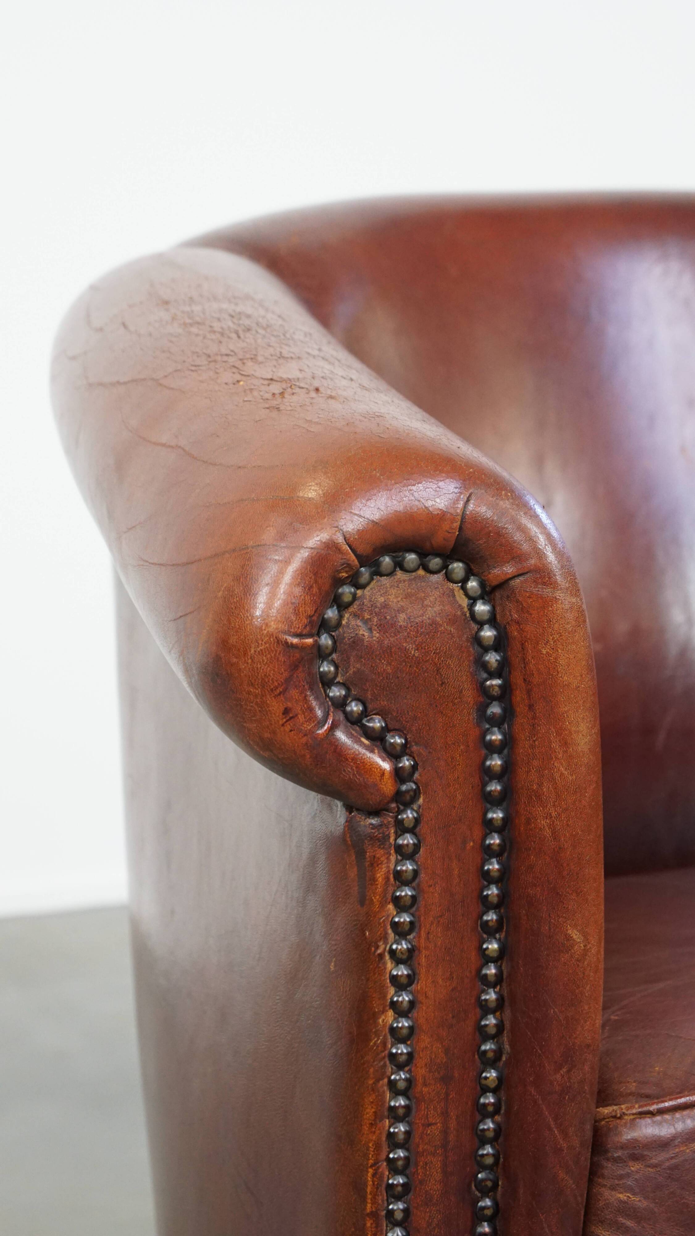 English style sheepskin club chair with a beautiful patina