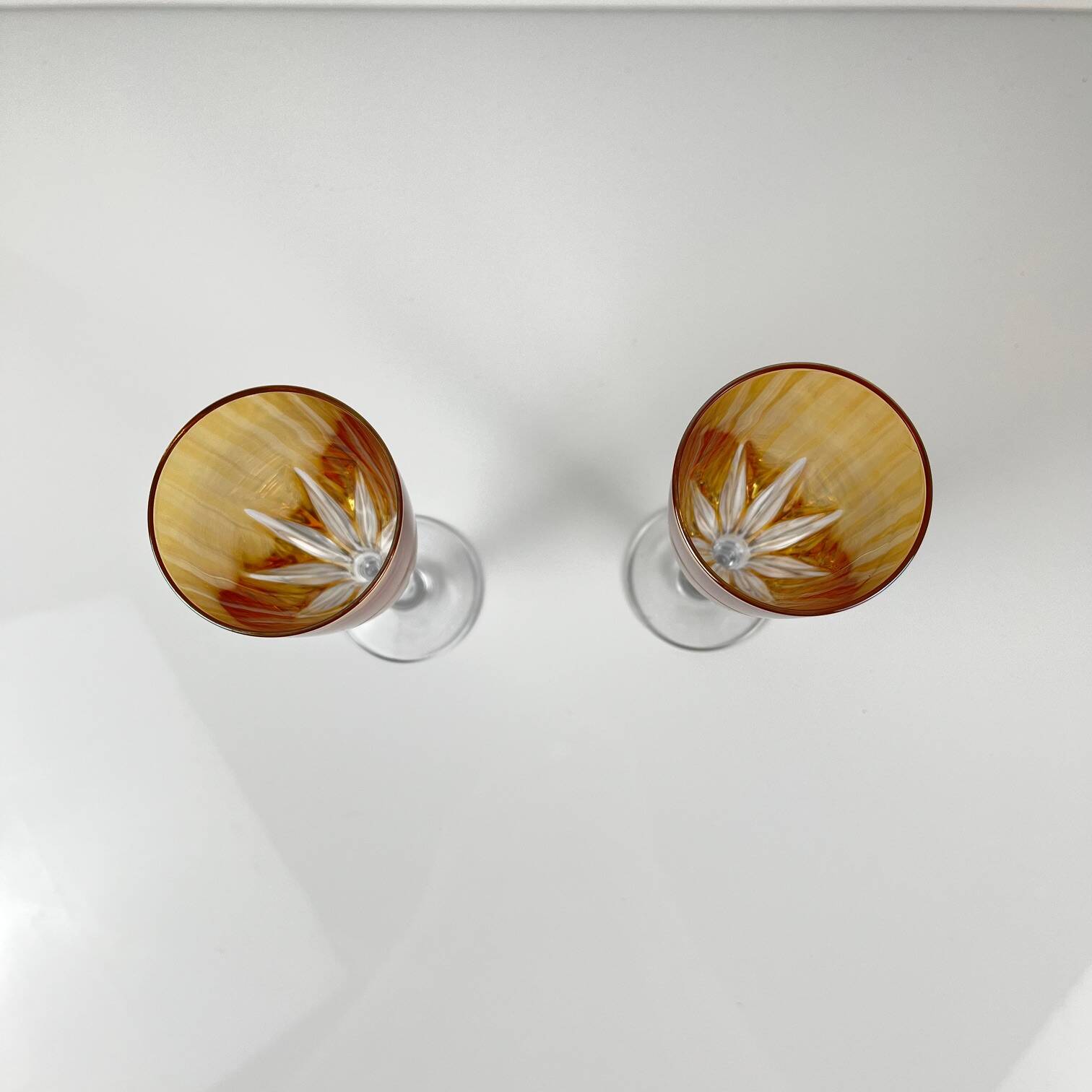 Yellow colored crystal champagne coupe duo
